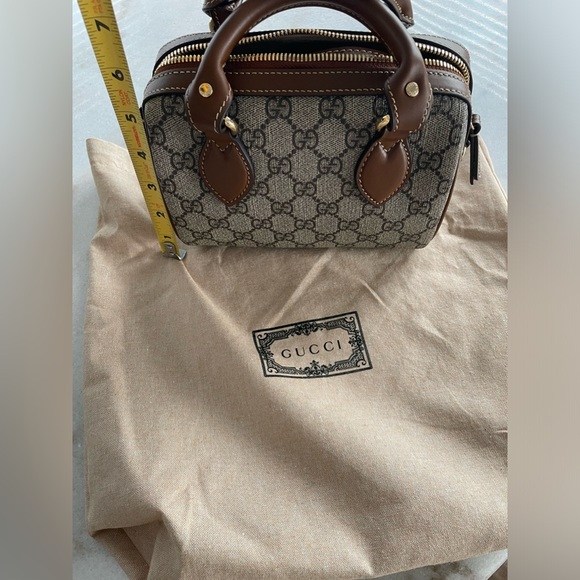 Gucci mini top handle bag. Like new- perfect condition. 
Dust bag included - Picture 7 of 7